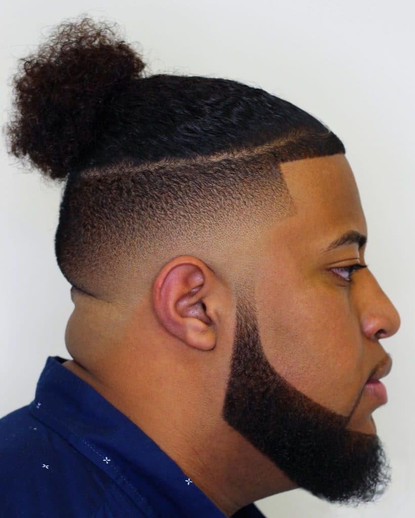 Curly undercut fade with beard