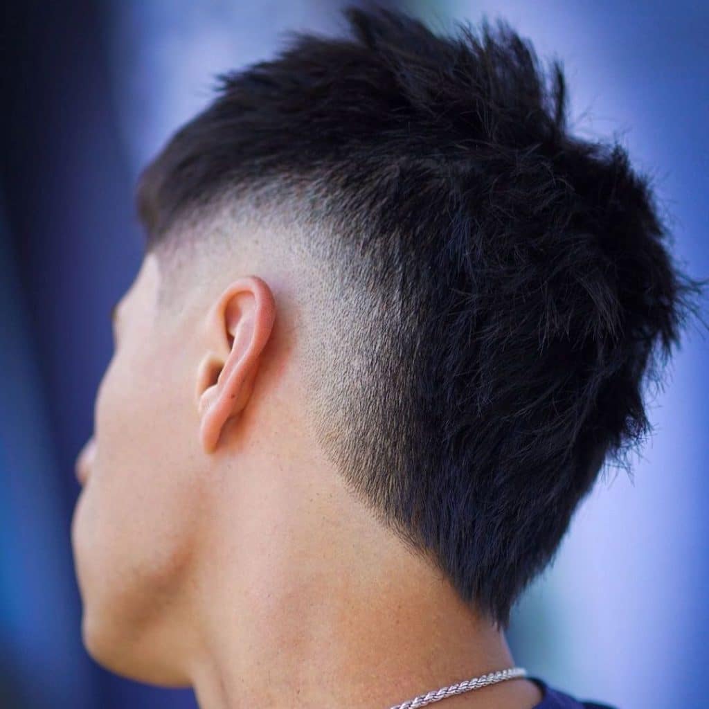 Burst fade mohawk haircut