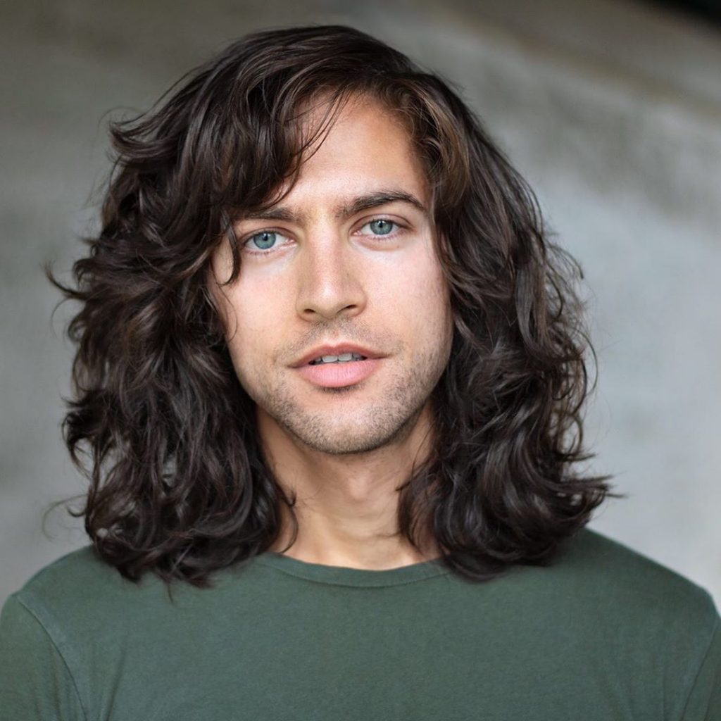 Long curly haircuts for men with fringe