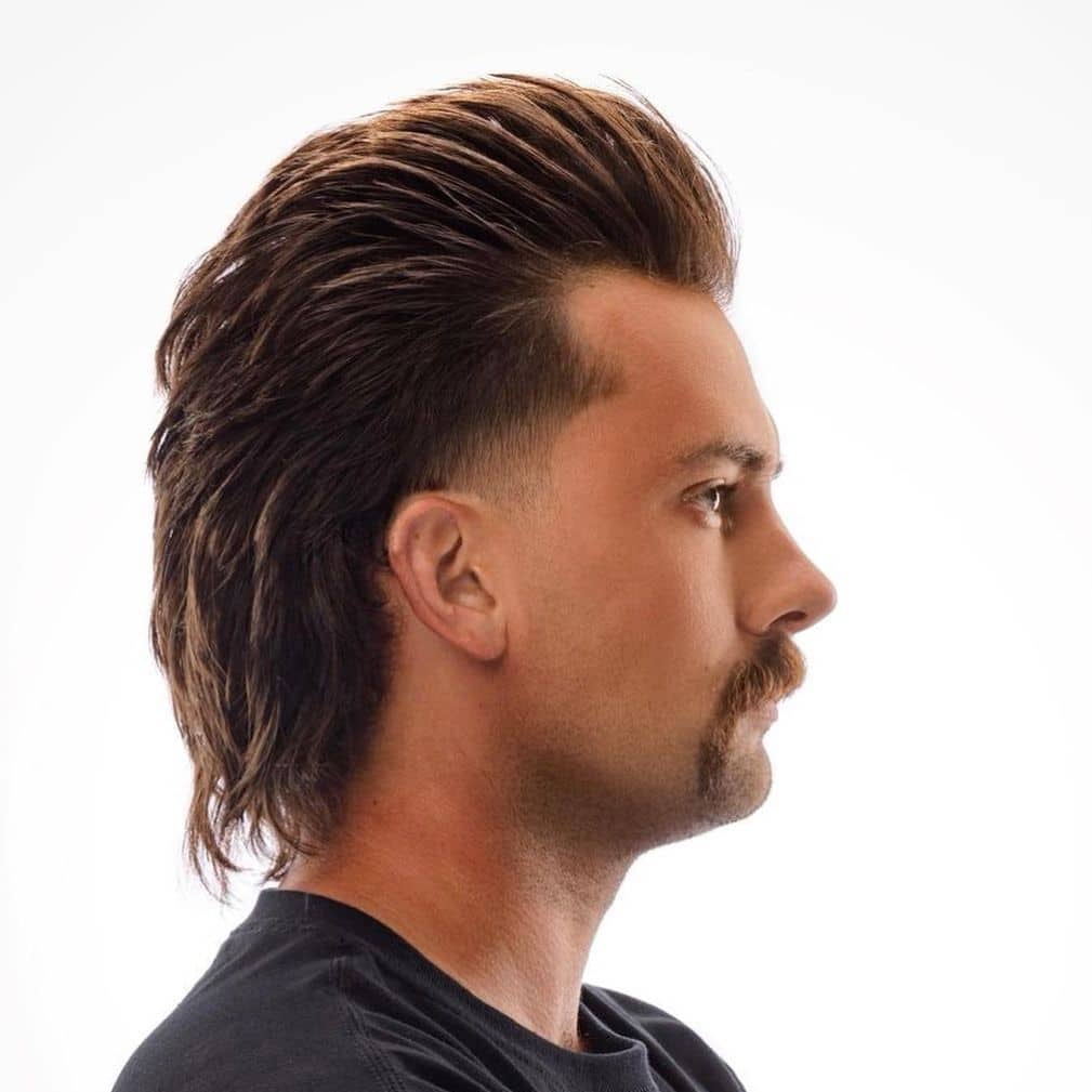 Medium length men's haircut mullet