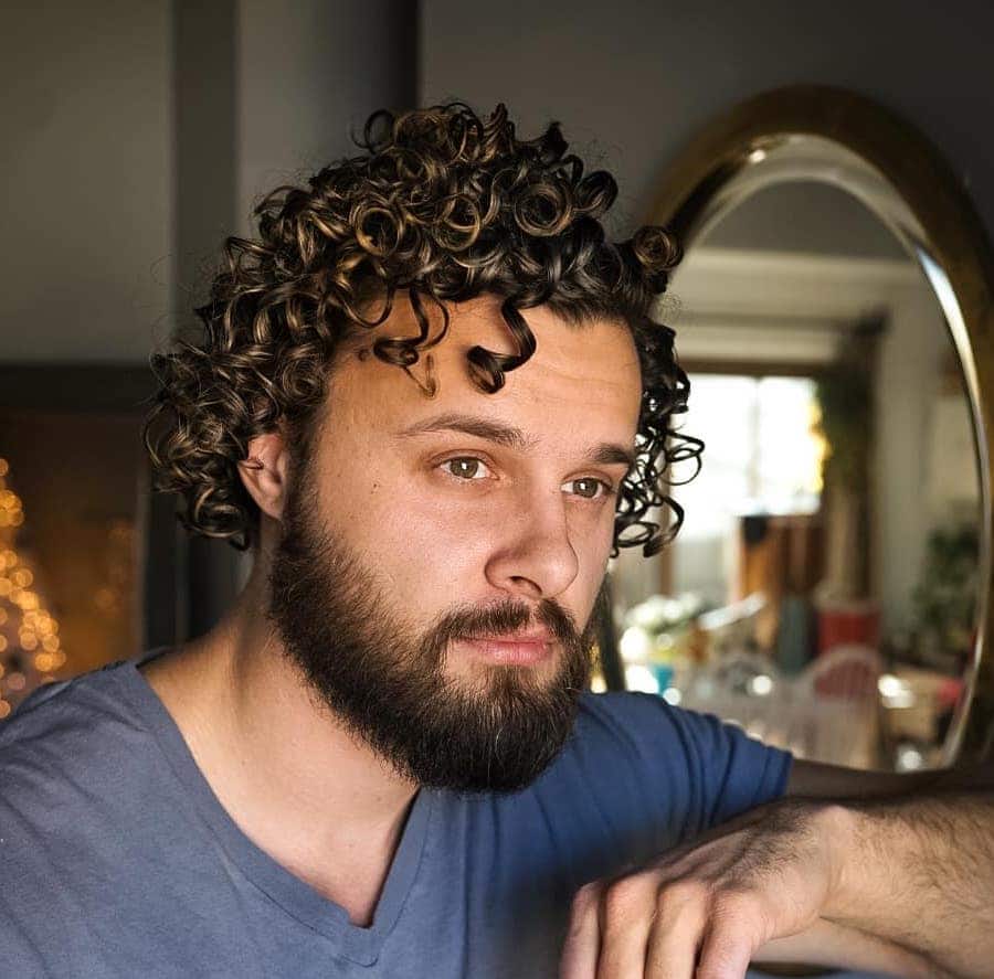 Medium length curly hair for men with beard