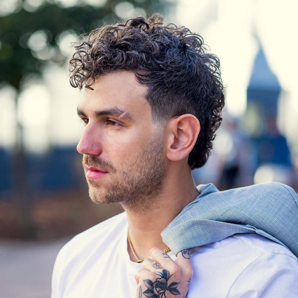 Short curly hair men temple fade