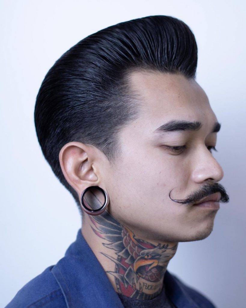 Greaser pompadour with handlebar mustache