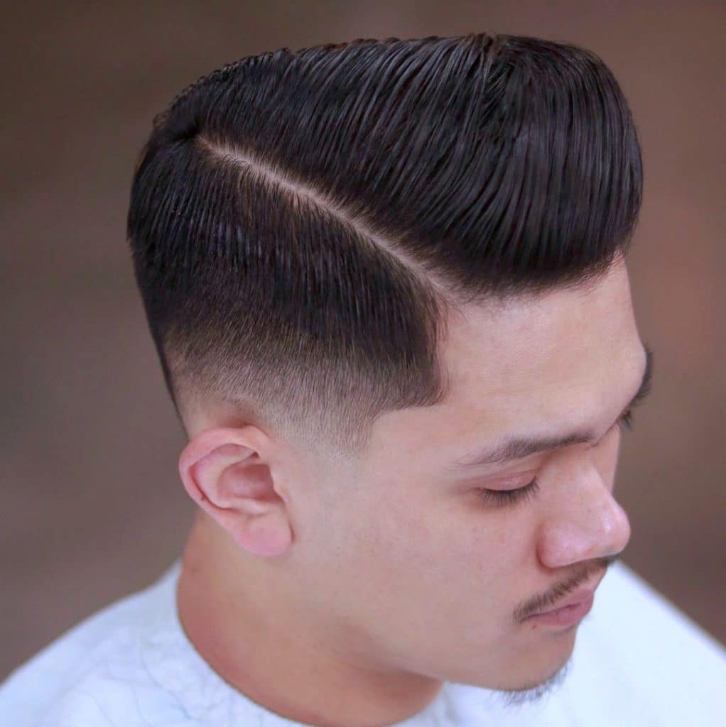 Side part pompadour fade