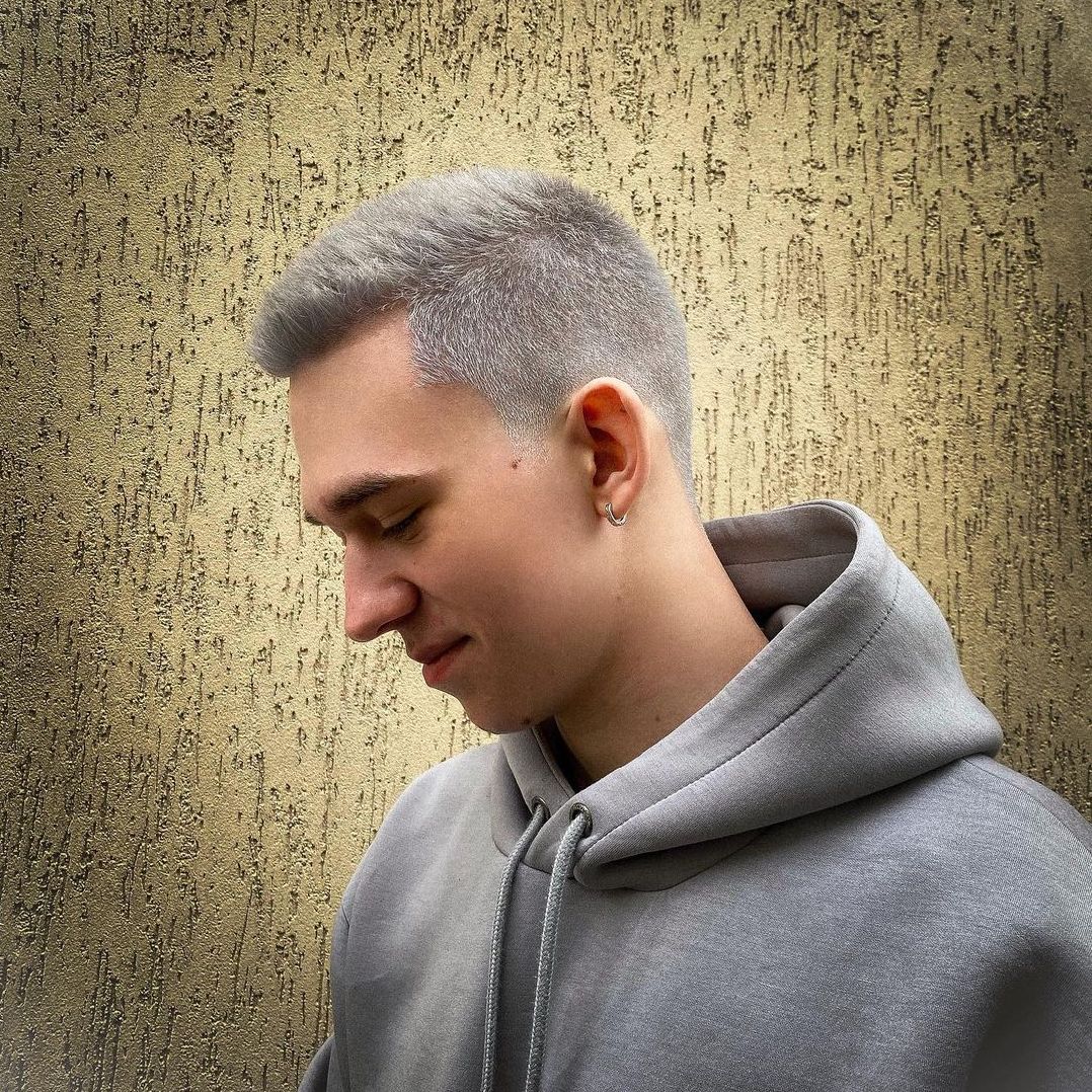 Shadow fade haircut with platinum silver hair color men