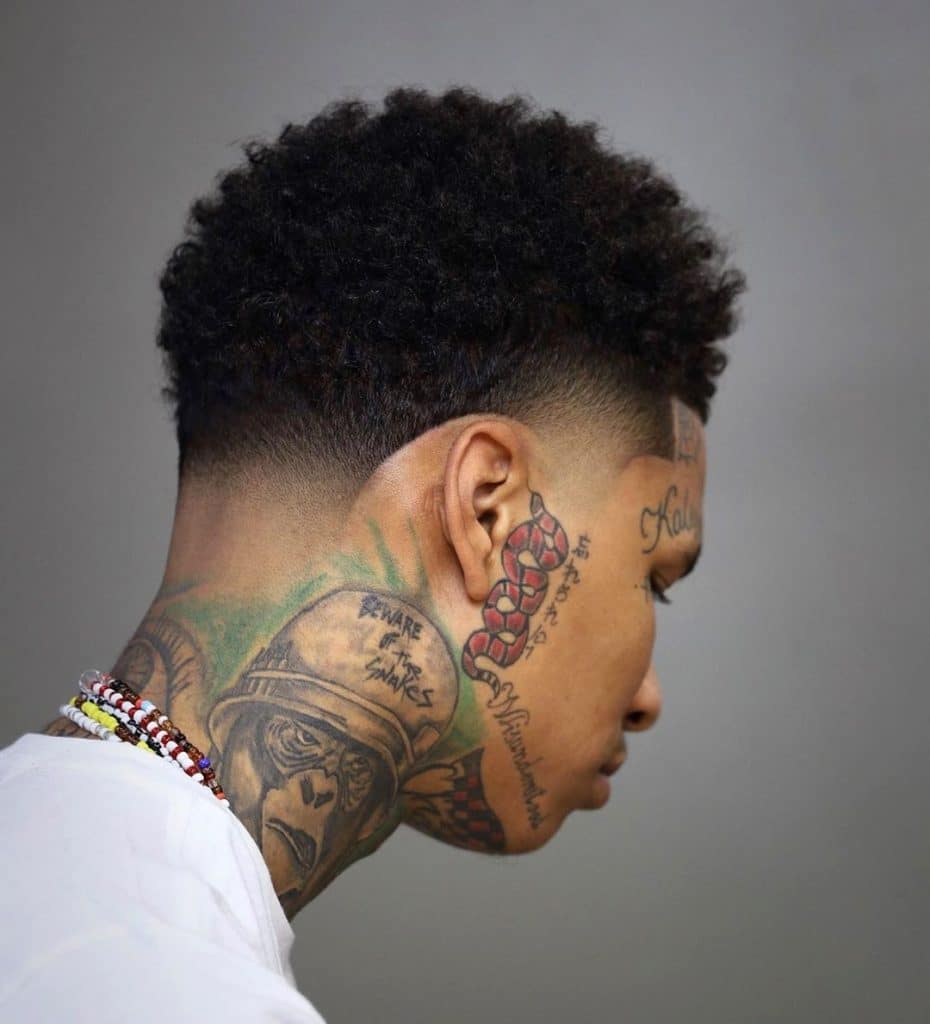 Taper fade for black men with curly hair