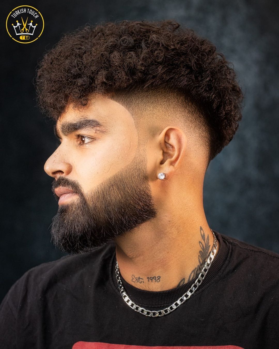 Curly high drop fade haircut