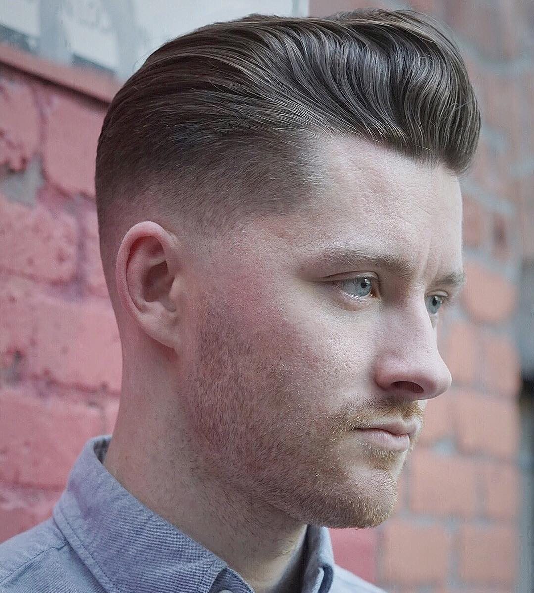 Pompadour hairstyle with a low fade