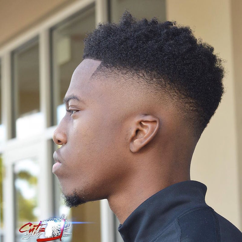 changeman__and high skin fade curls haircut