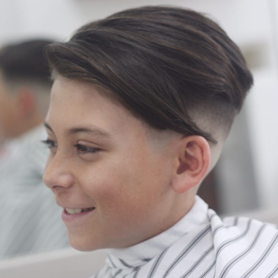 Boys undercut haircut and mid bald fade