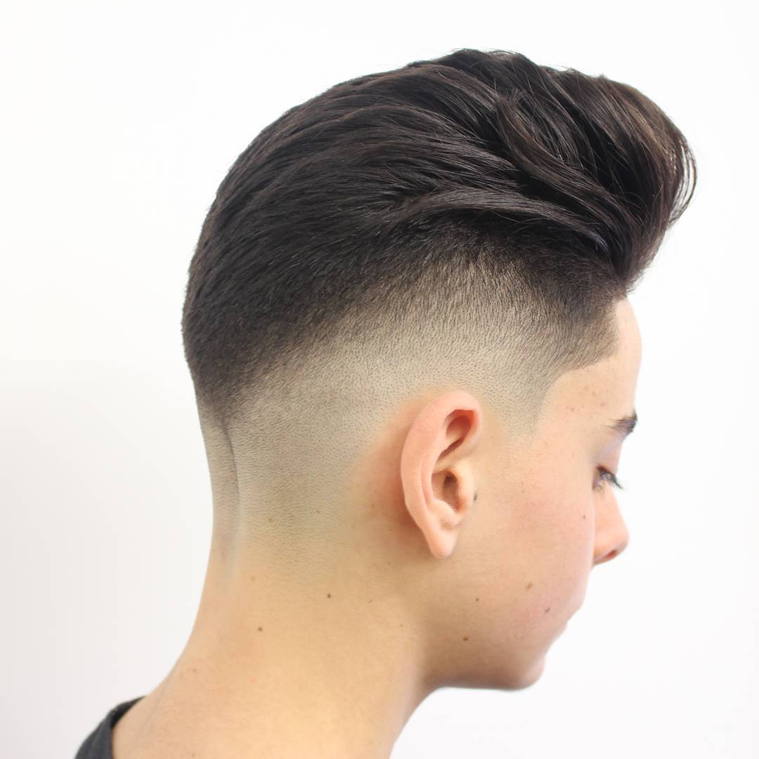 Mid fade pompadour haircut