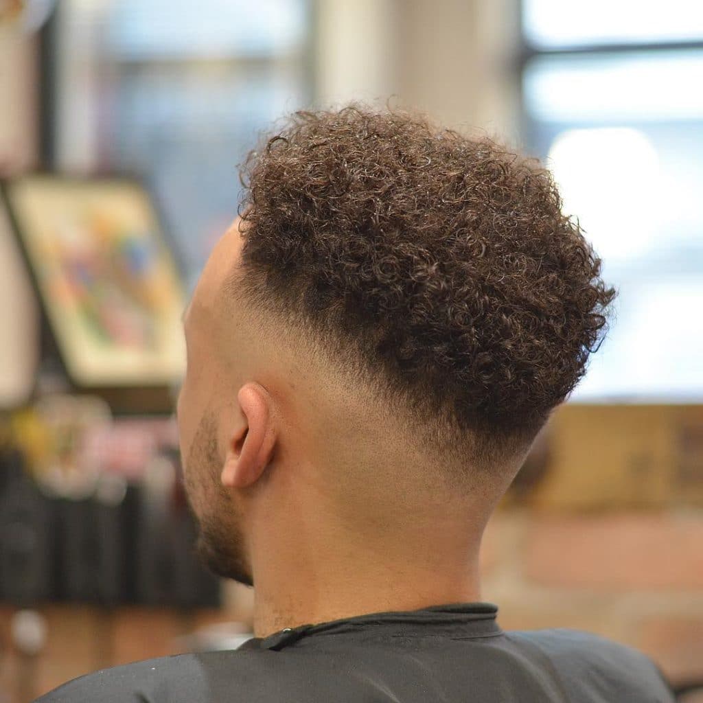 Mid skin fade haircut