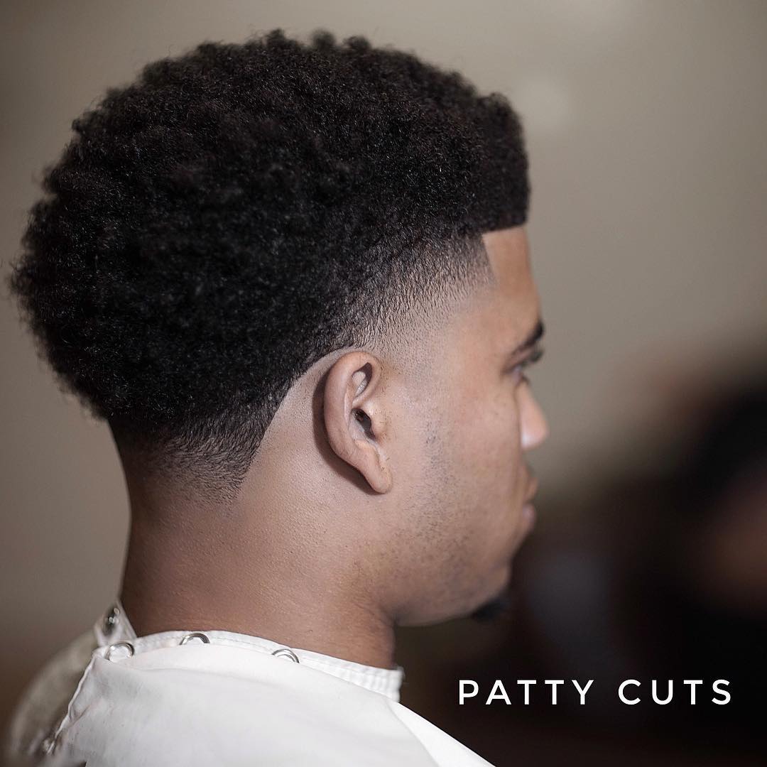 patty_cuts high skin fade blowout haircut for black men back view