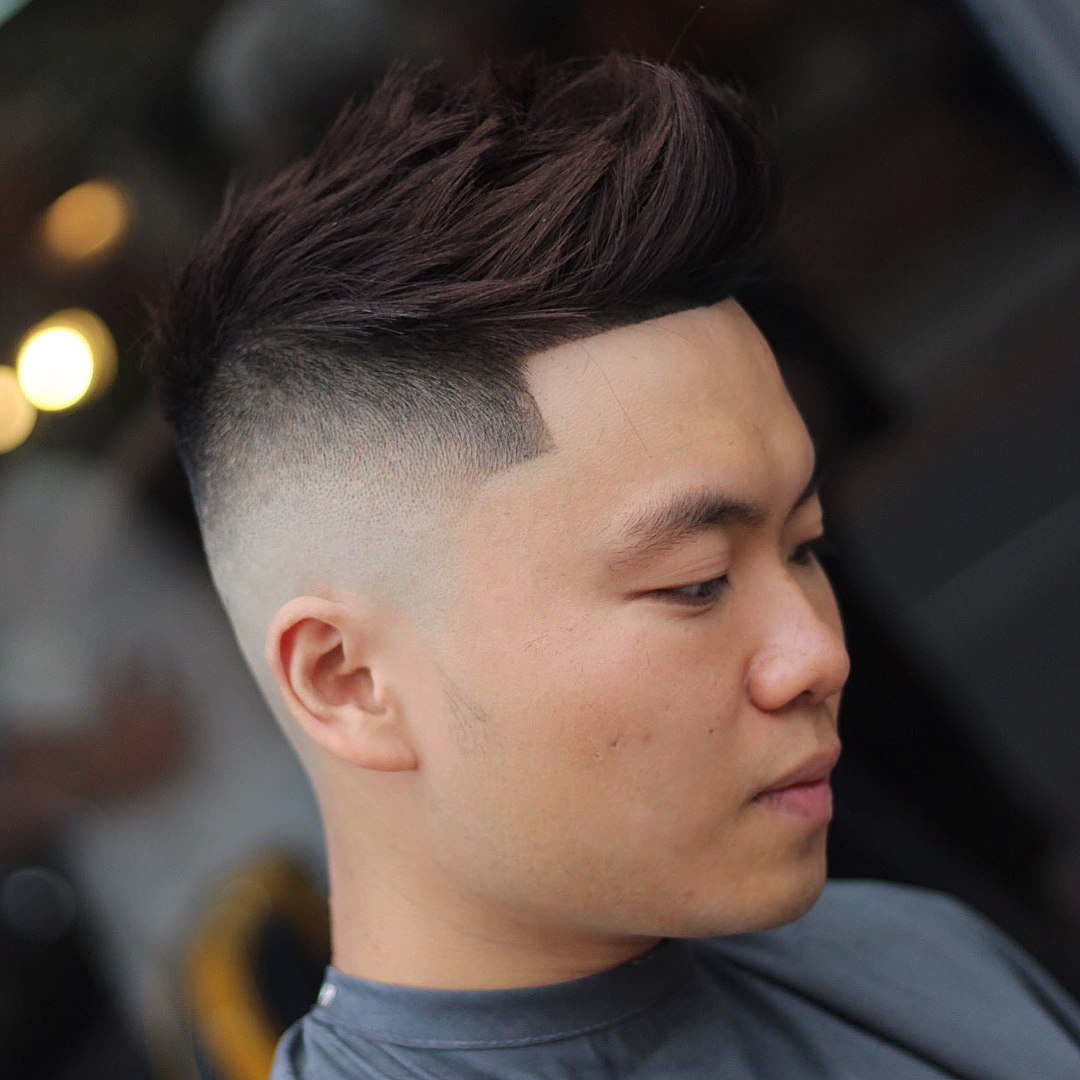 Faux hawk bald fade haircut