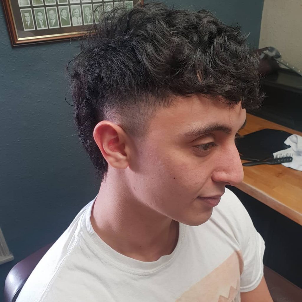 Curly hair mohawk fade