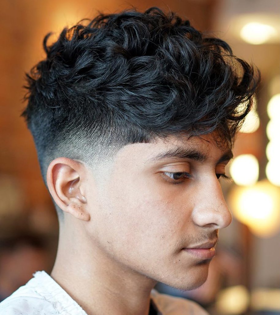 Curly textured crop mens haircut 